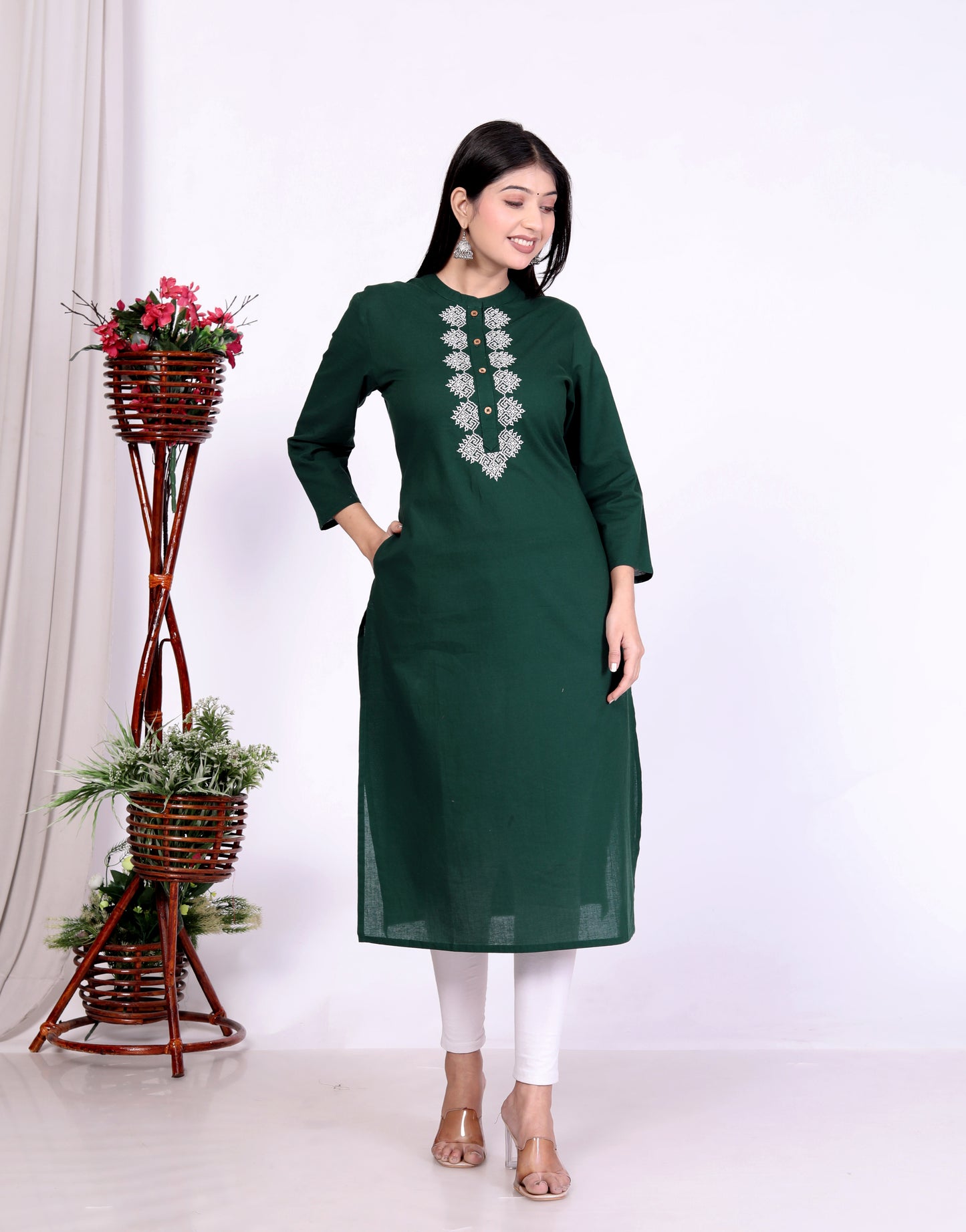 Sakura Women's Dark Green Cambric Cotton Kurti with Intricate Thread Embroidery