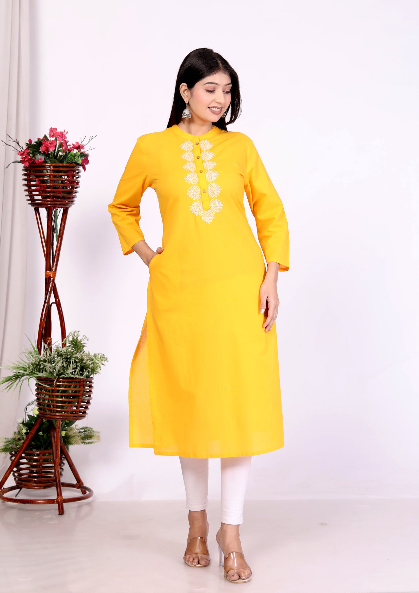 Sakura Women's Yellow Cambric Cotton Kurti with Intricate Thread Embroidery